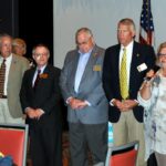Associate Governor Don Alberti (far right) and Assistant Governors